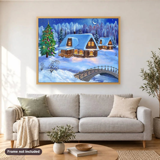 A Snowy White Christmas diamond painting shown framed on a living room wall above a sofa
