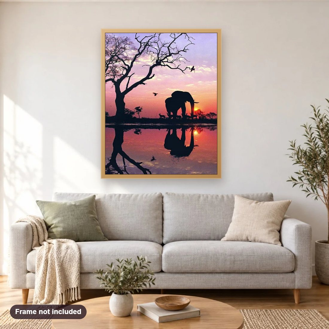 African Elephant & Sunset View diamond painting shown framed on a living room wall above a sofa