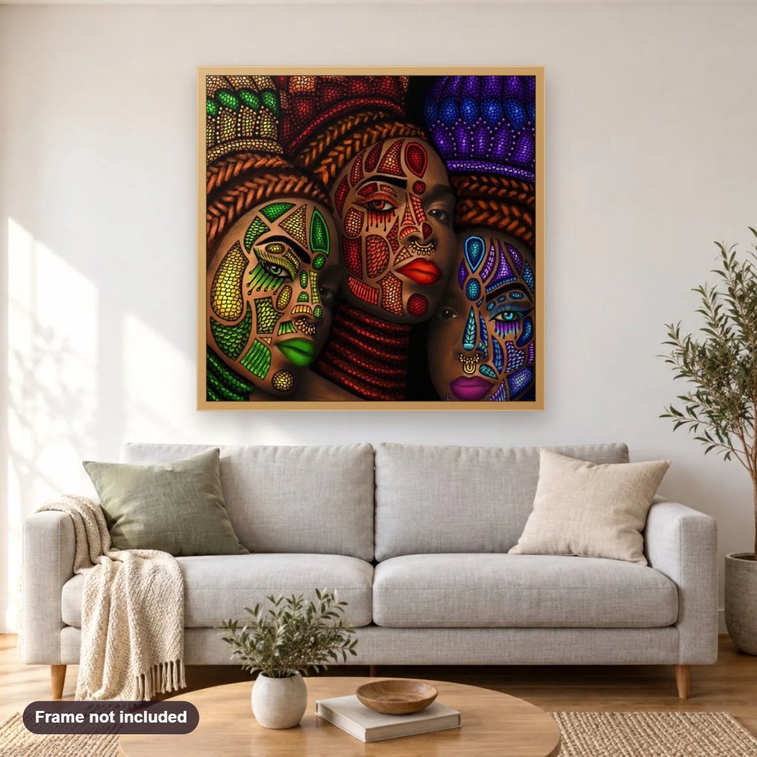African Tribe Women Face diamond painting shown framed on a living room wall above a sofa