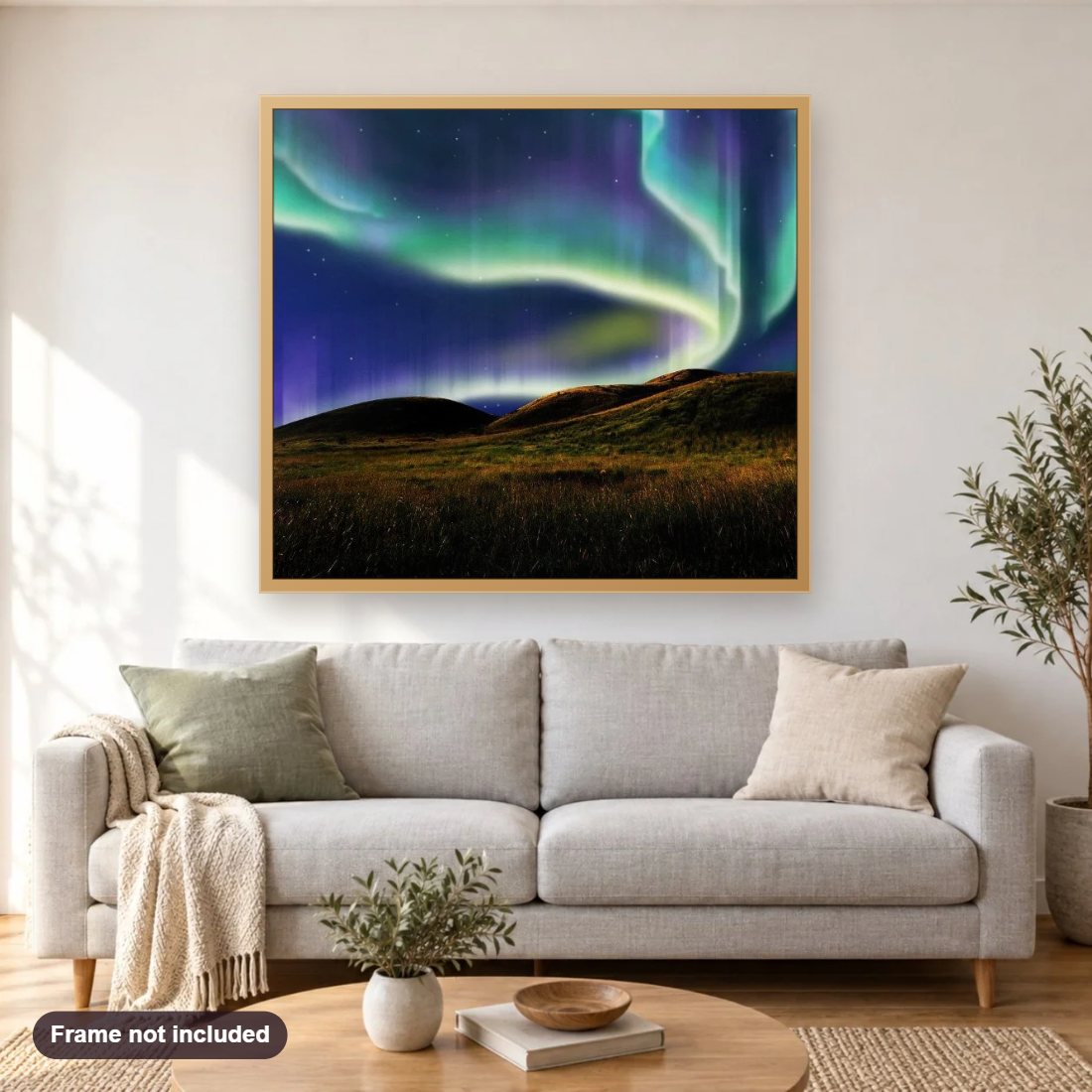 Alaska Northern Lights diamond painting shown framed on a living room wall above a sofa