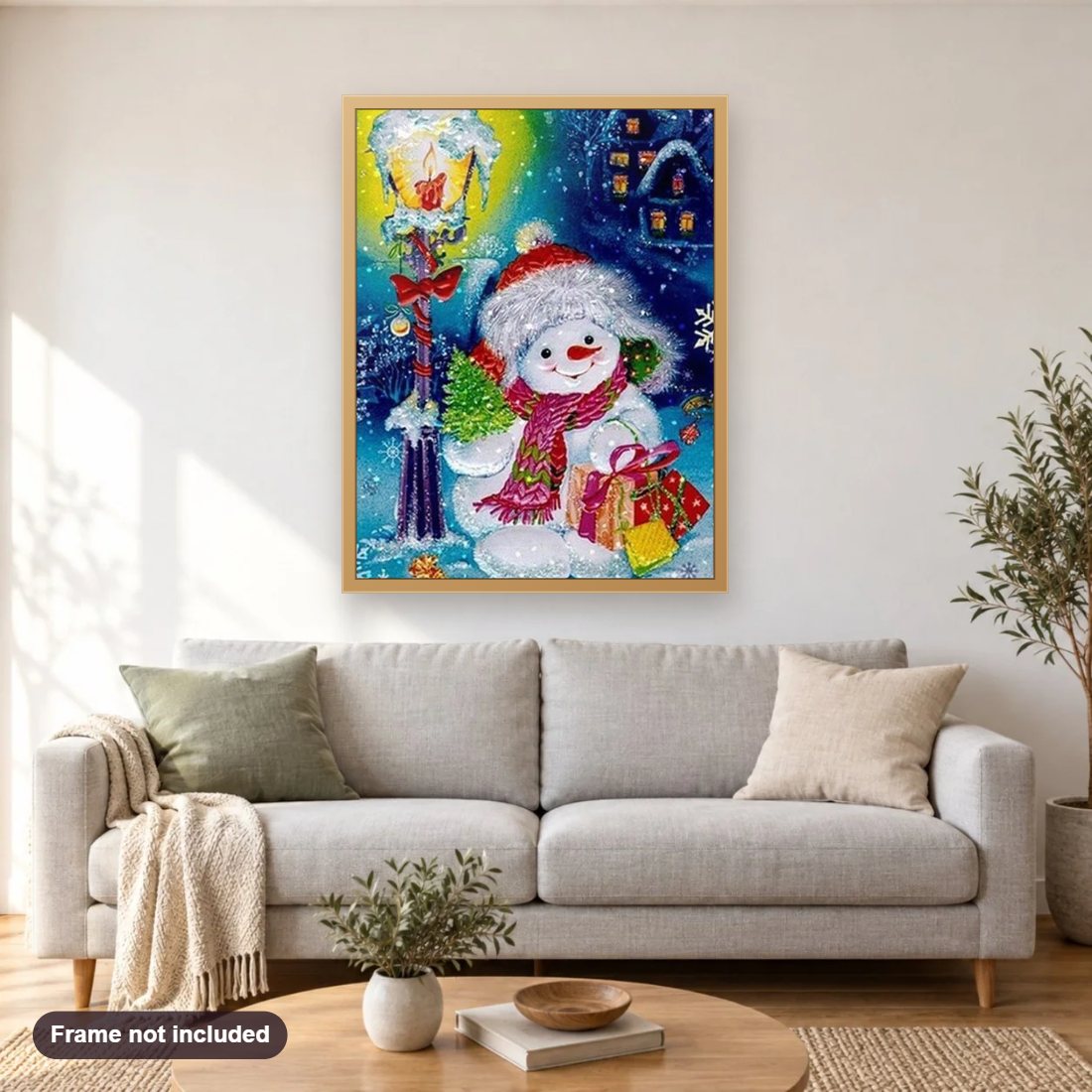 All I Want For Christmas diamond painting shown framed on a living room wall above a sofa