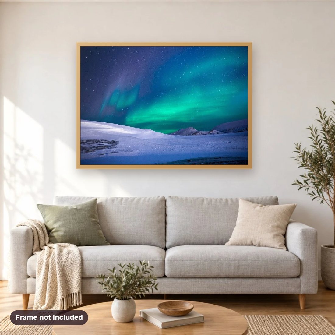 Arctic Aurora diamond painting shown framed on a living room wall above a sofa
