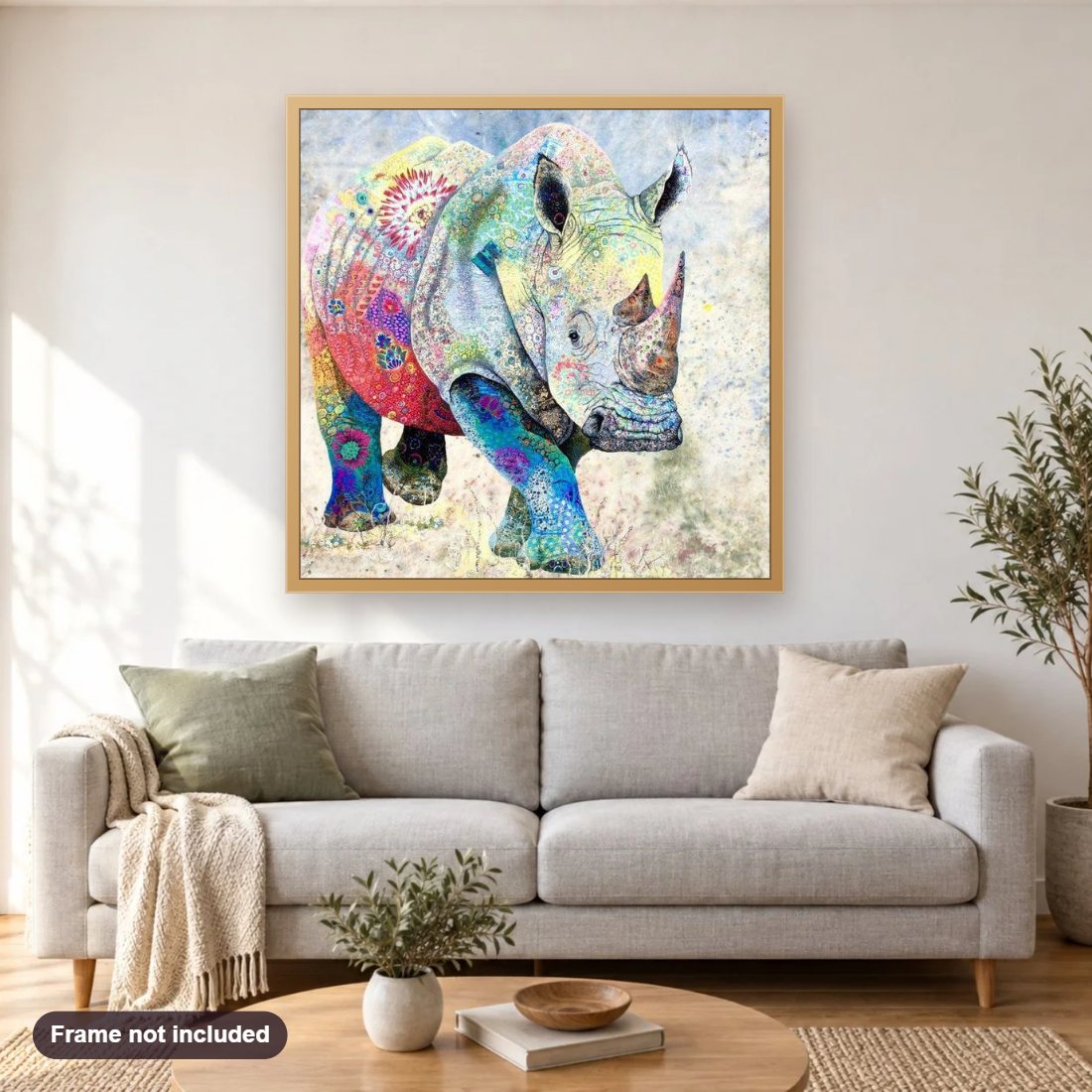 Artistic Rhino diamond painting shown framed on a living room wall above a sofa
