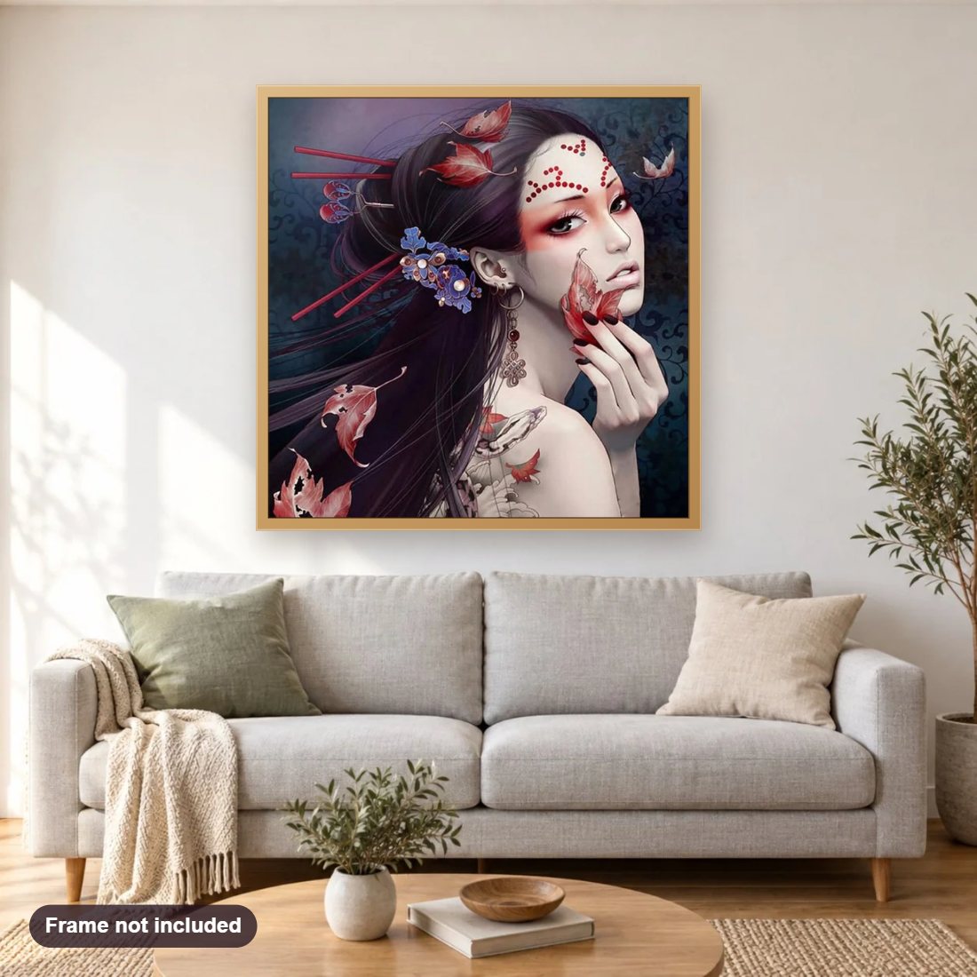 Asian Beauty diamond painting shown framed on a living room wall above a sofa
