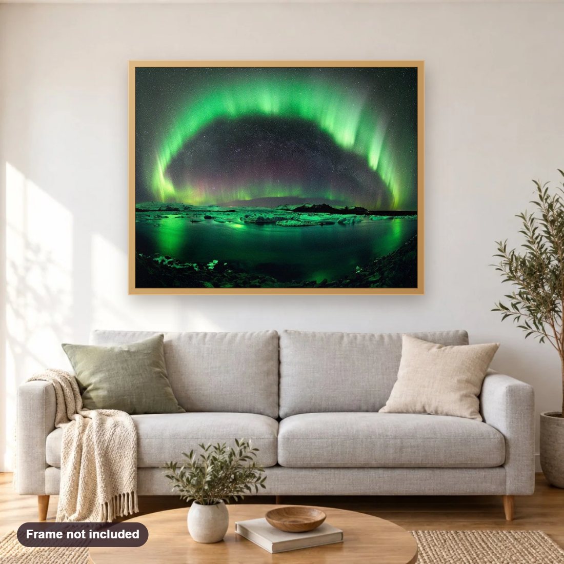 Aurora Australis diamond painting shown framed on a living room wall above a sofa