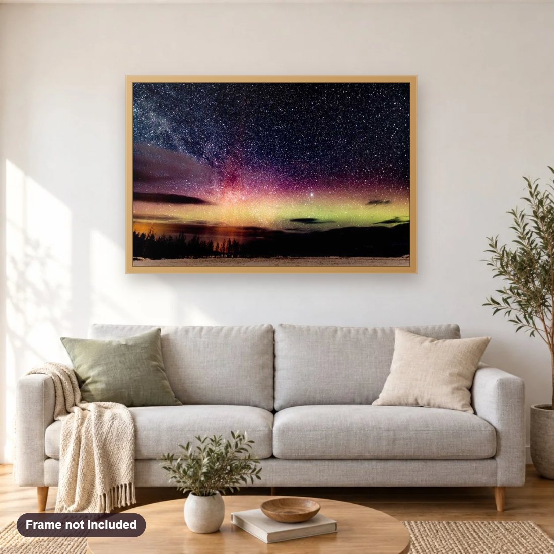 Aurora Borealis Night Sky diamond painting shown framed on a living room wall above a sofa