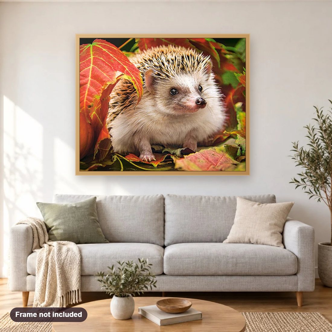 Autumn Hedgehog diamond painting shown framed on a living room wall above a sofa