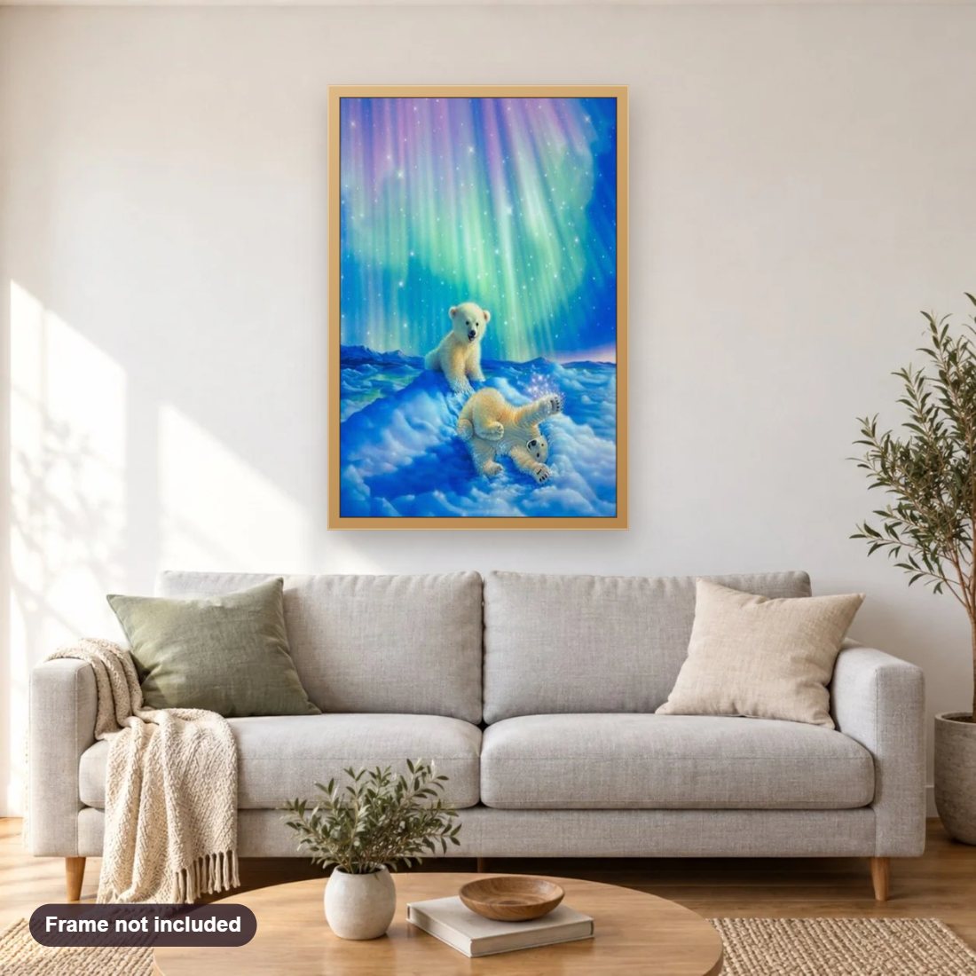 Baby Bears & Aurora Lights diamond painting shown framed on a living room wall above a sofa