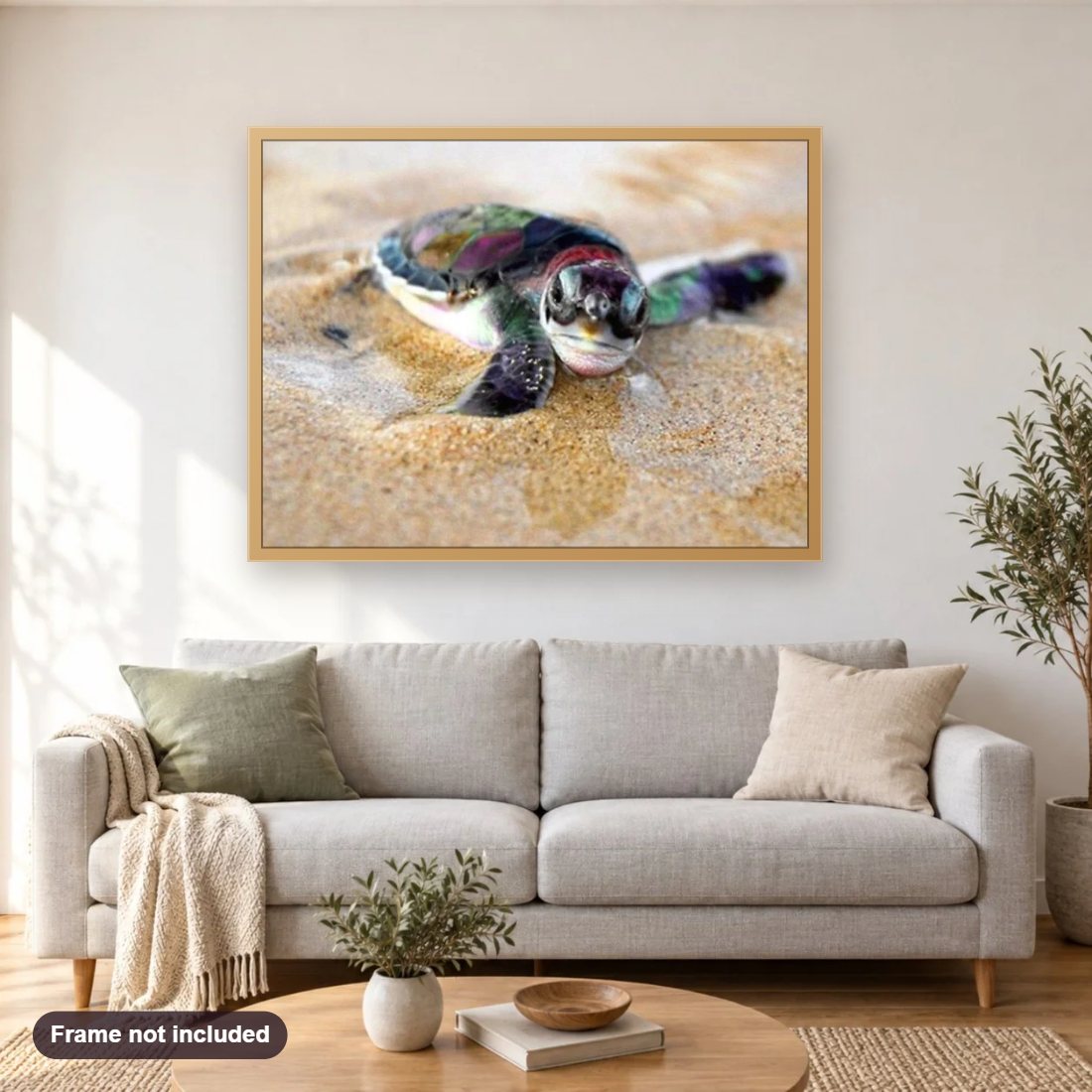 Baby Turtle diamond painting shown framed on a living room wall above a sofa