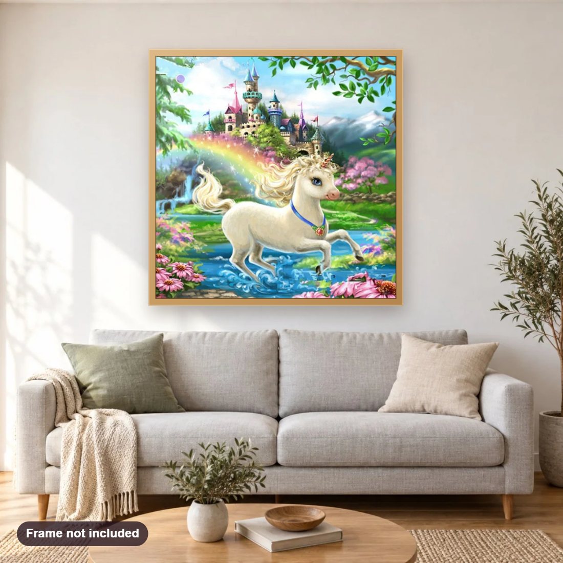 Baby Unicorn & Castle in Fantasy Land diamond painting shown framed on a living room wall above a sofa