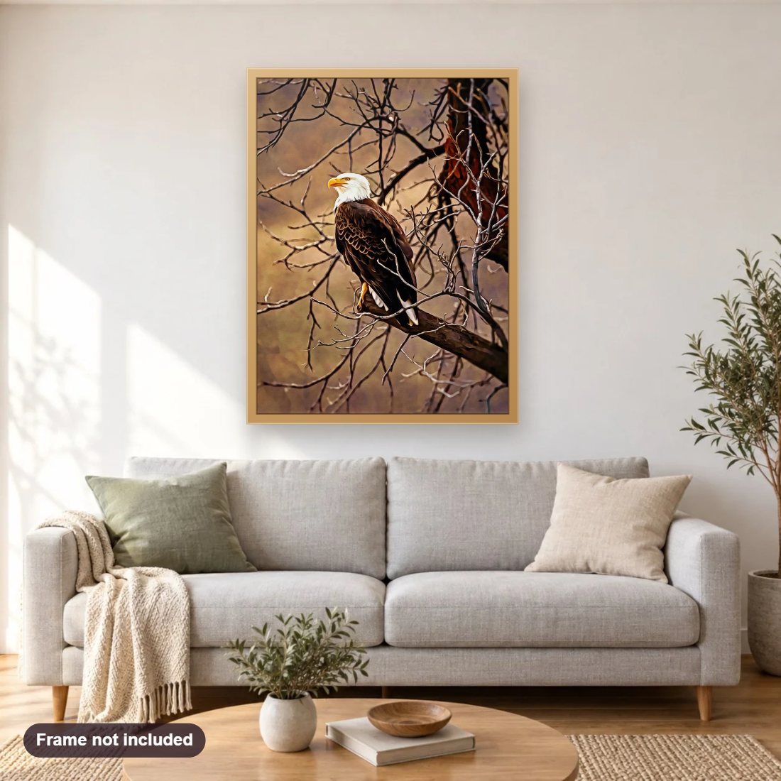 Bald Eagle diamond painting shown framed on a living room wall above a sofa