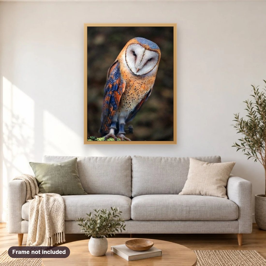 Barn Owl diamond painting shown framed on a living room wall above a sofa