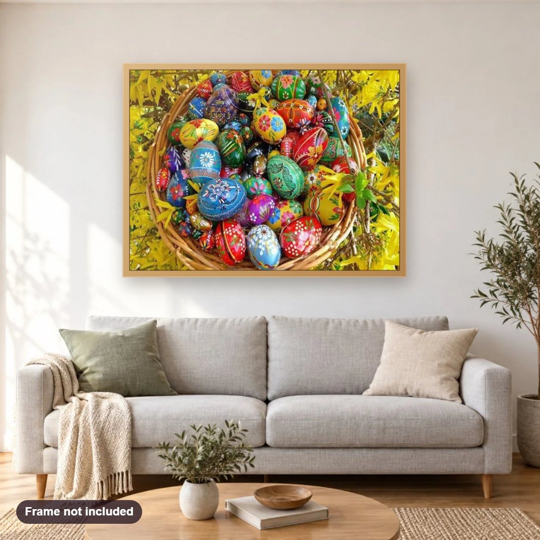 Basket full of Easter Eggs diamond painting shown framed on a living room wall above a sofa