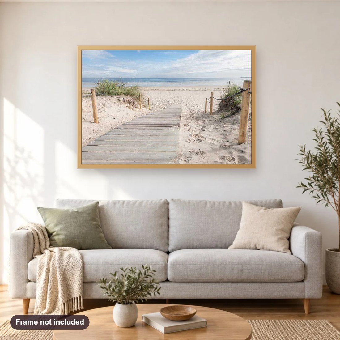 Beach Entrance diamond painting shown framed on a living room wall above a sofa