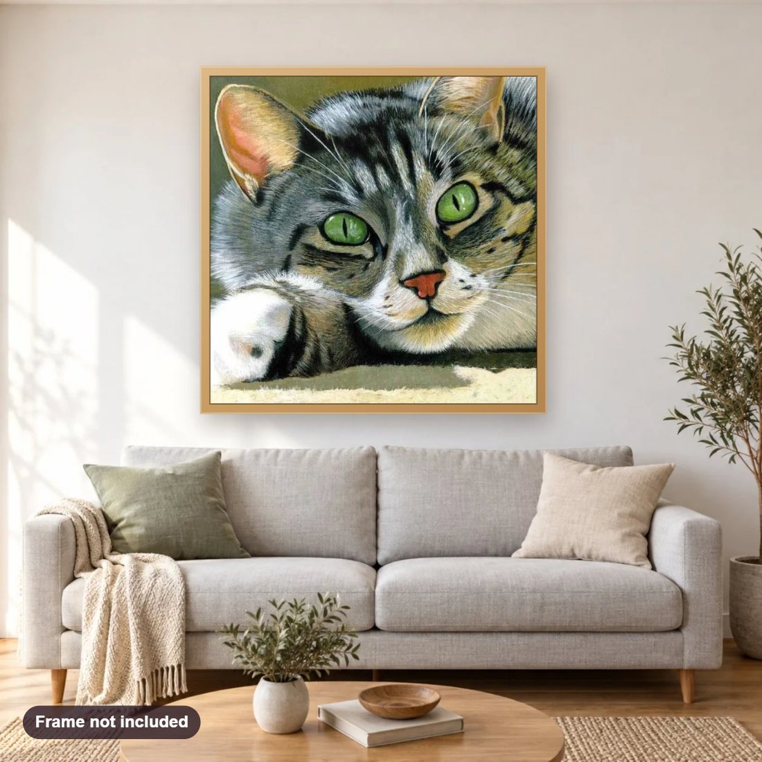 Beautiful Cat with Green Eyes diamond painting shown framed on a living room wall above a sofa