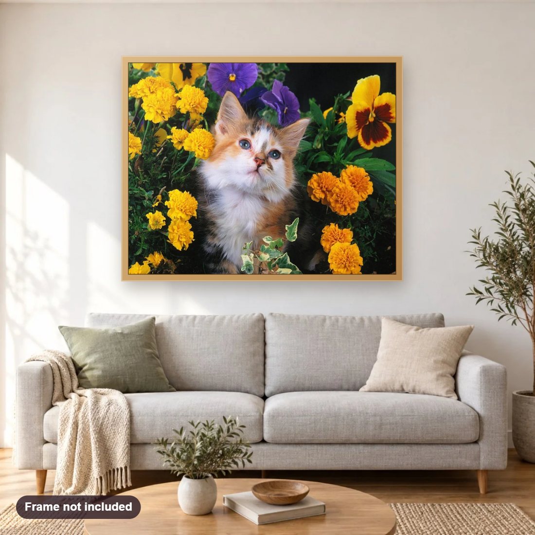 Beautiful Cat & Yellow Flowers diamond painting shown framed on a living room wall above a sofa