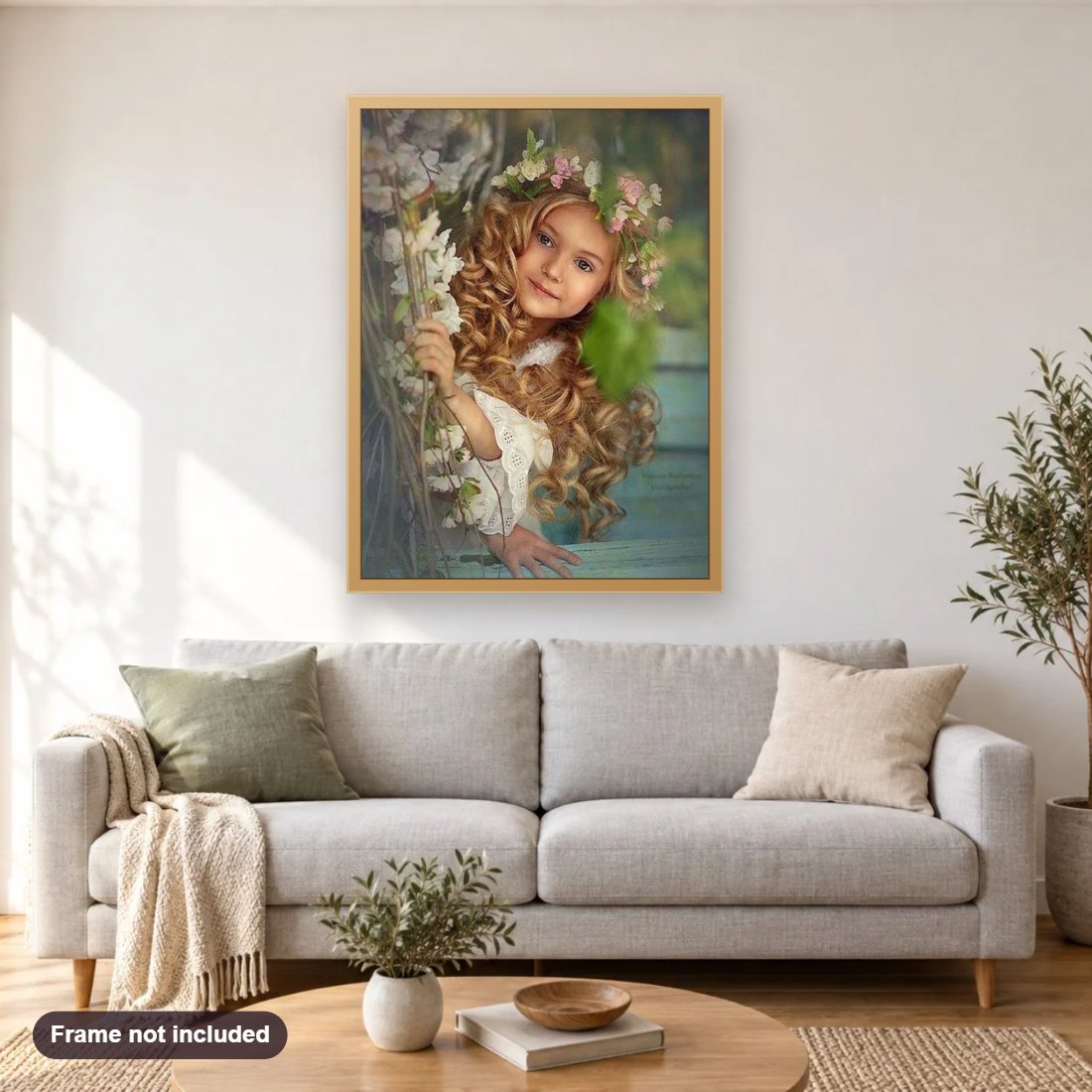 Beautiful Child with Flowers Crown diamond painting shown framed on a living room wall above a sofa