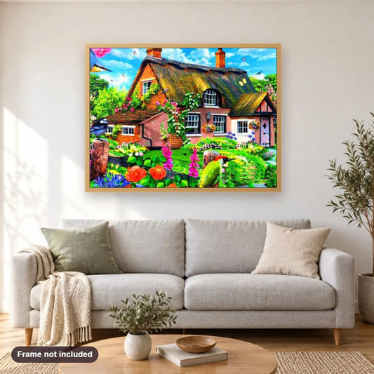 Beautiful Cottage by Howard Robinson diamond painting shown framed on a living room wall above a sofa