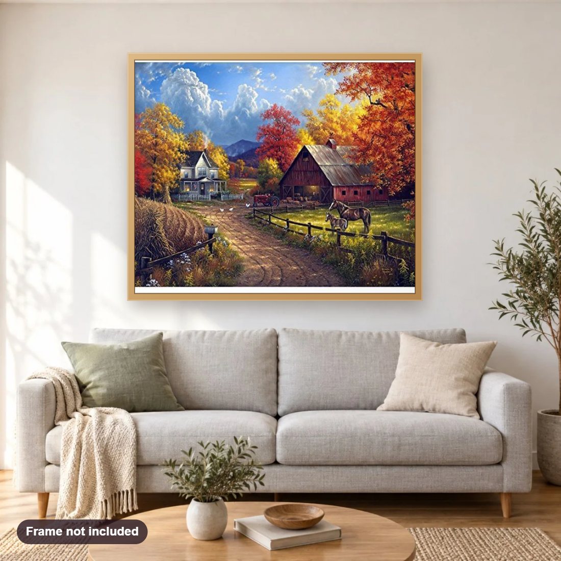 Beautiful Farm & Horses diamond painting shown framed on a living room wall above a sofa