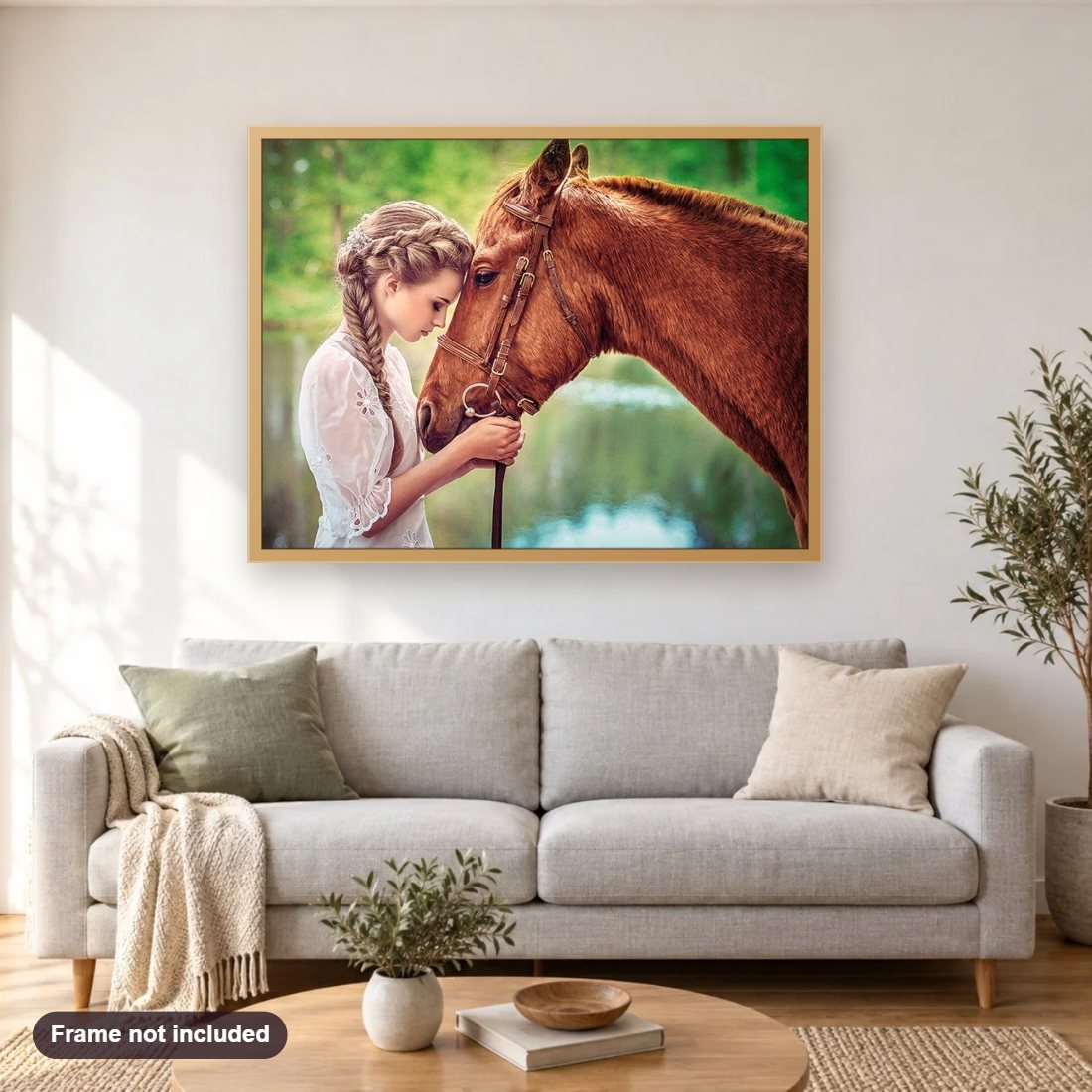 Beautiful Girl & Horse diamond painting shown framed on a living room wall above a sofa