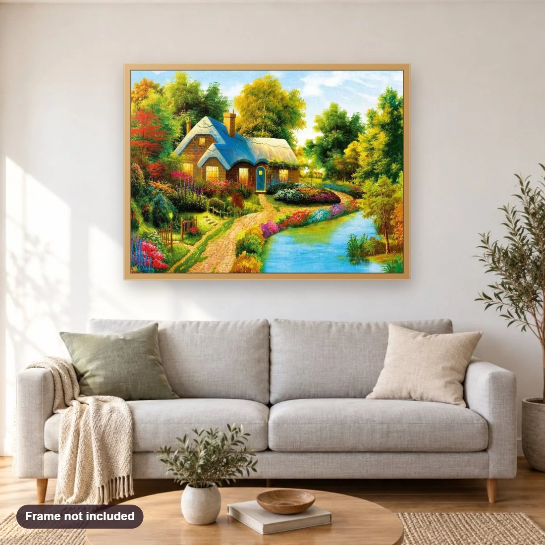 Beautiful House Surrounded by Trees diamond painting shown framed on a living room wall above a sofa