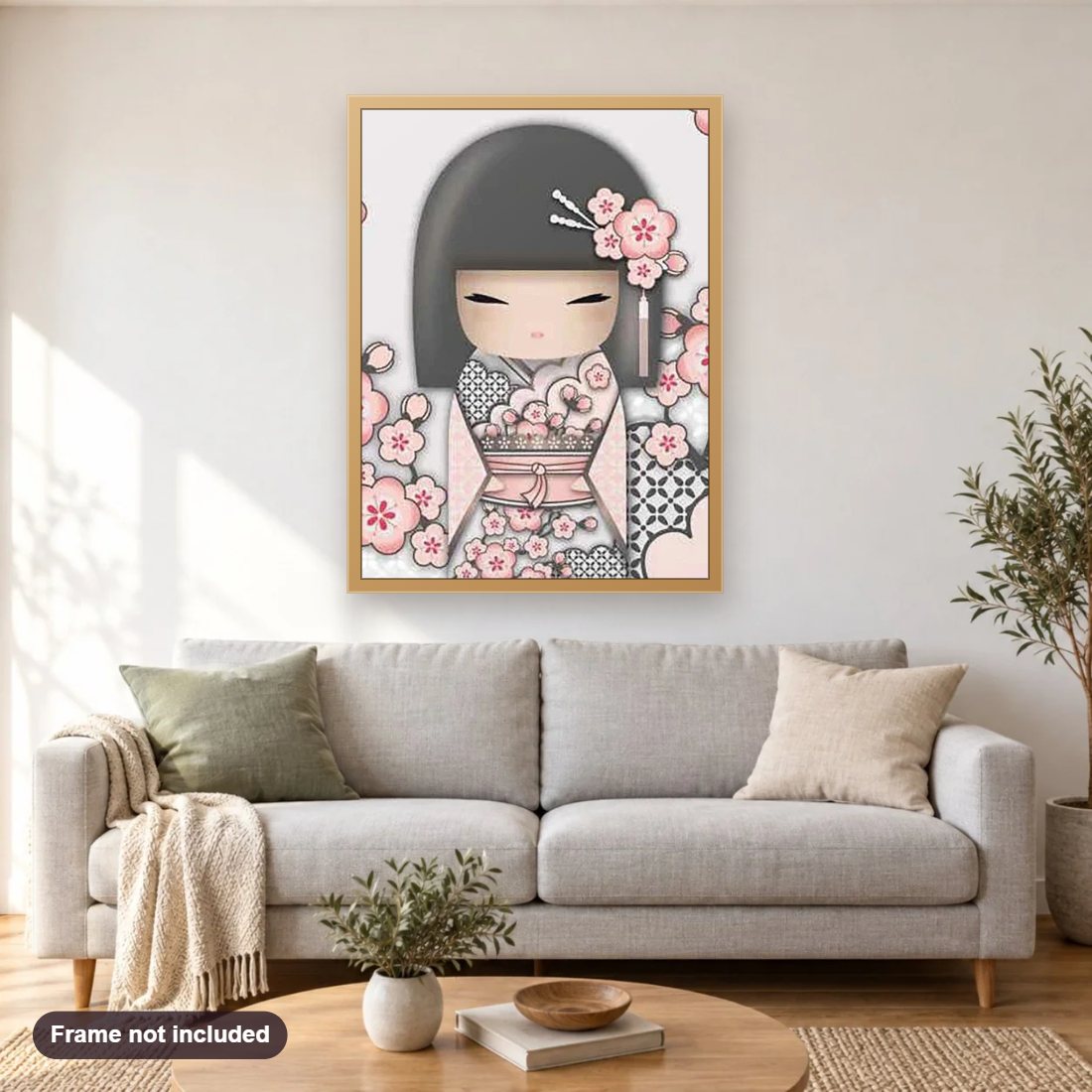 Beautiful Kokeshi Doll diamond painting shown framed on a living room wall above a sofa