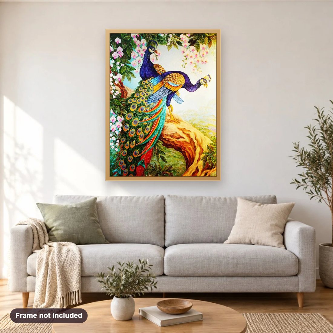 Beautiful Peafowl Pair diamond painting shown framed on a living room wall above a sofa
