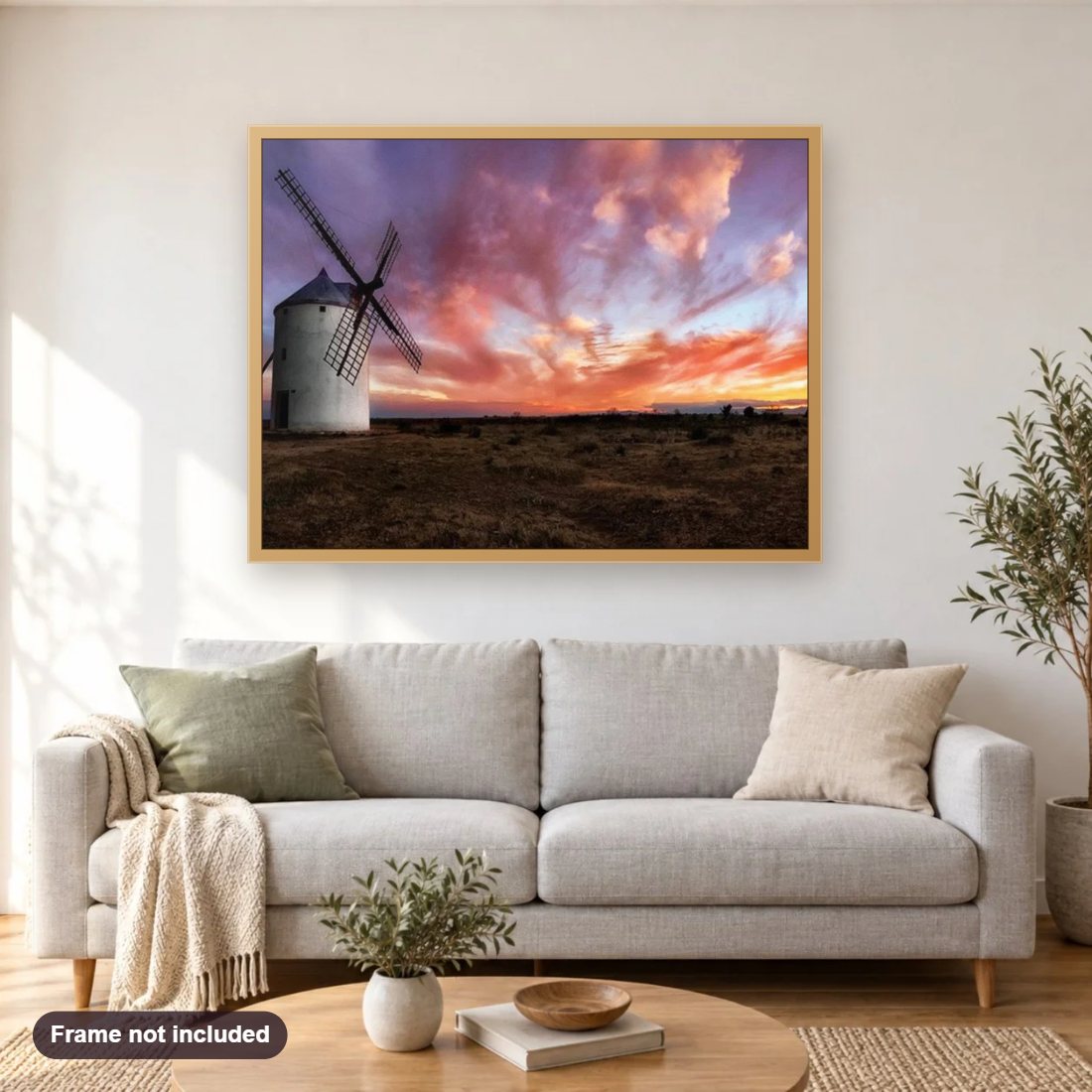 Beautiful Sky & Windmill Landscape diamond painting shown framed on a living room wall above a sofa