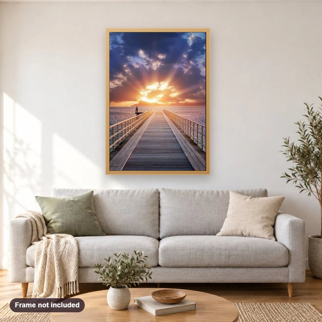Beautiful Sunrise & Clouds diamond painting shown framed on a living room wall above a sofa