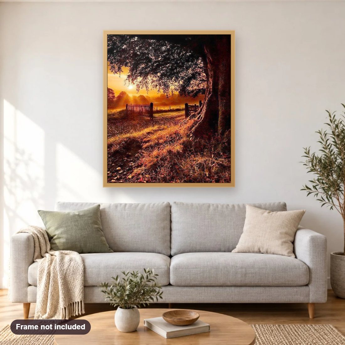 Beautiful Sunrise diamond painting shown framed on a living room wall above a sofa