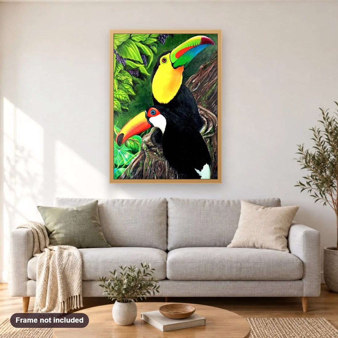 Beautiful Toucan Birds Pair diamond painting shown framed on a living room wall above a sofa