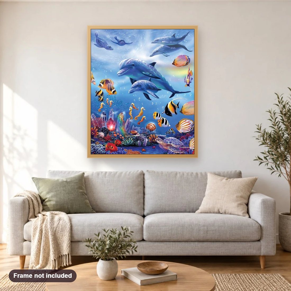 Beautiful Under Water World diamond painting shown framed on a living room wall above a sofa