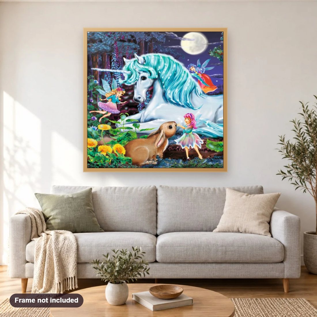 Beautiful Unicorn & Little Fairies diamond painting shown framed on a living room wall above a sofa