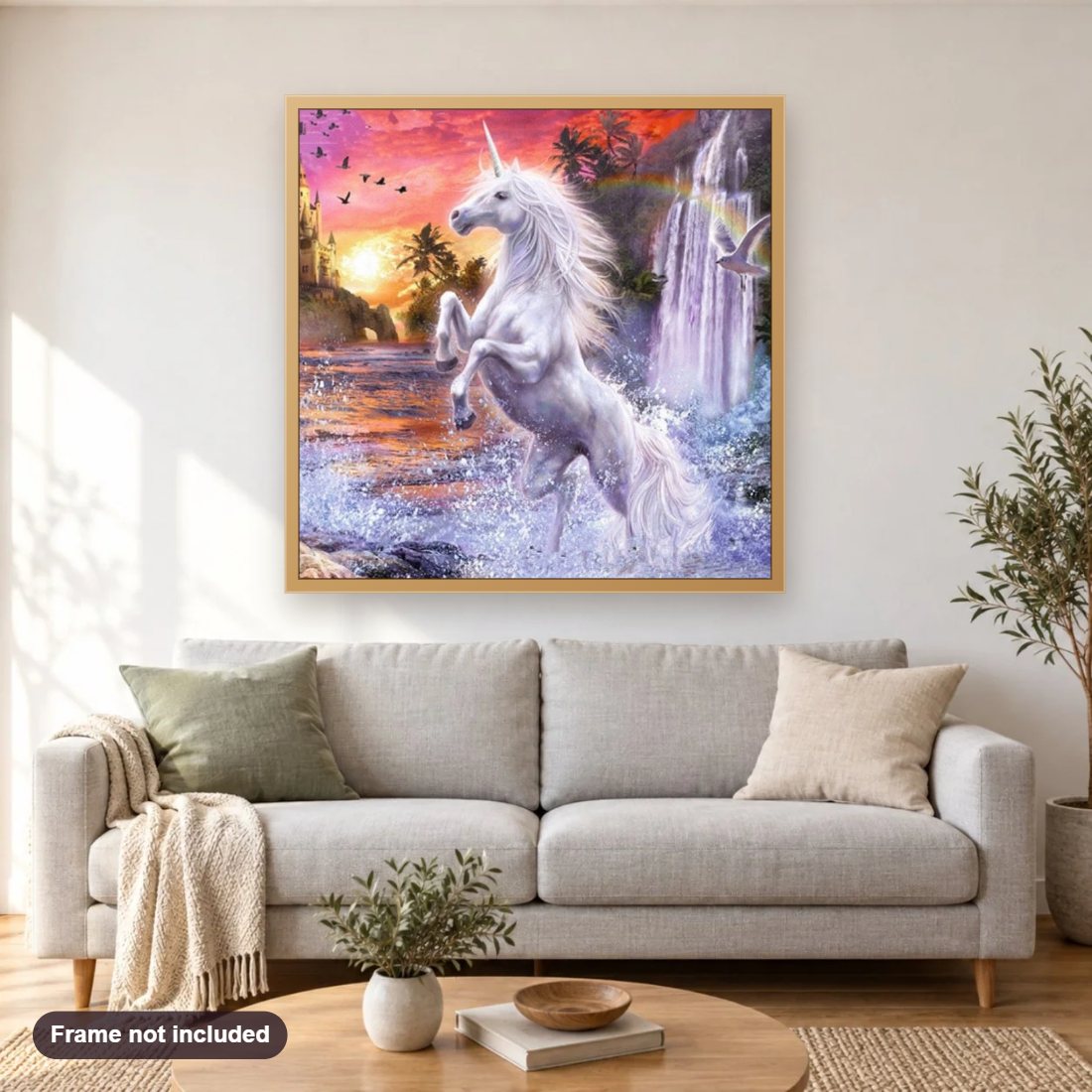 Beautiful Waterfall & Unicorn diamond painting shown framed on a living room wall above a sofa
