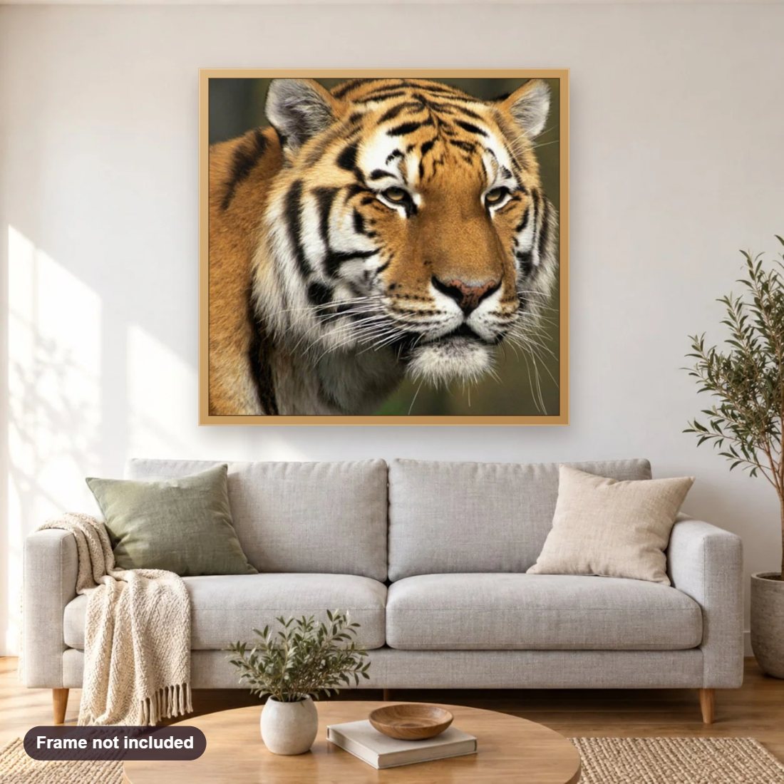 Big Cat diamond painting shown framed on a living room wall above a sofa