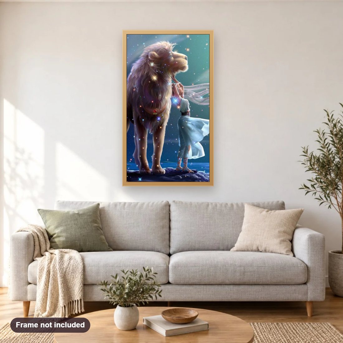 Big Lion & Girl diamond painting shown framed on a living room wall above a sofa
