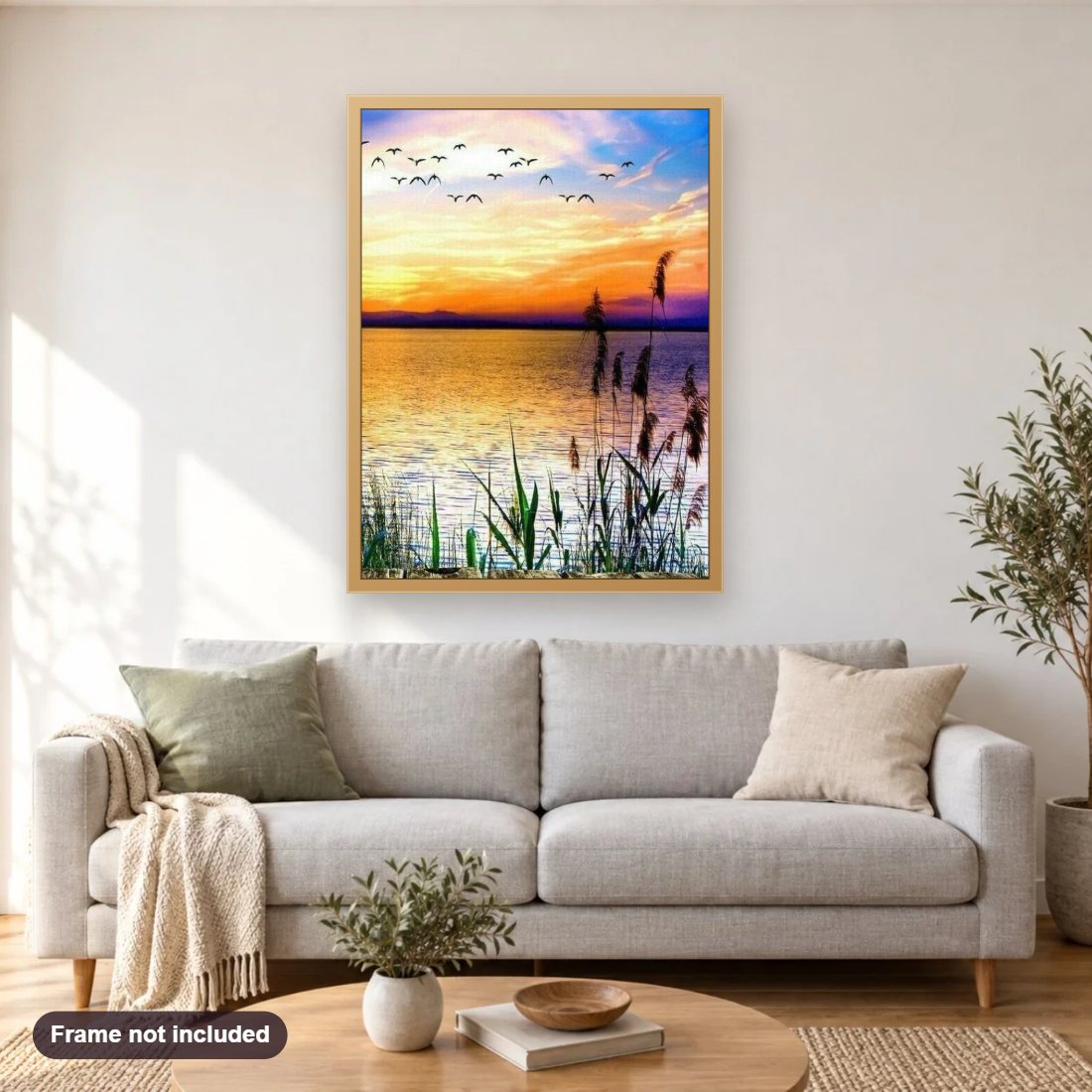 Birds Coming Back to Homes diamond painting shown framed on a living room wall above a sofa