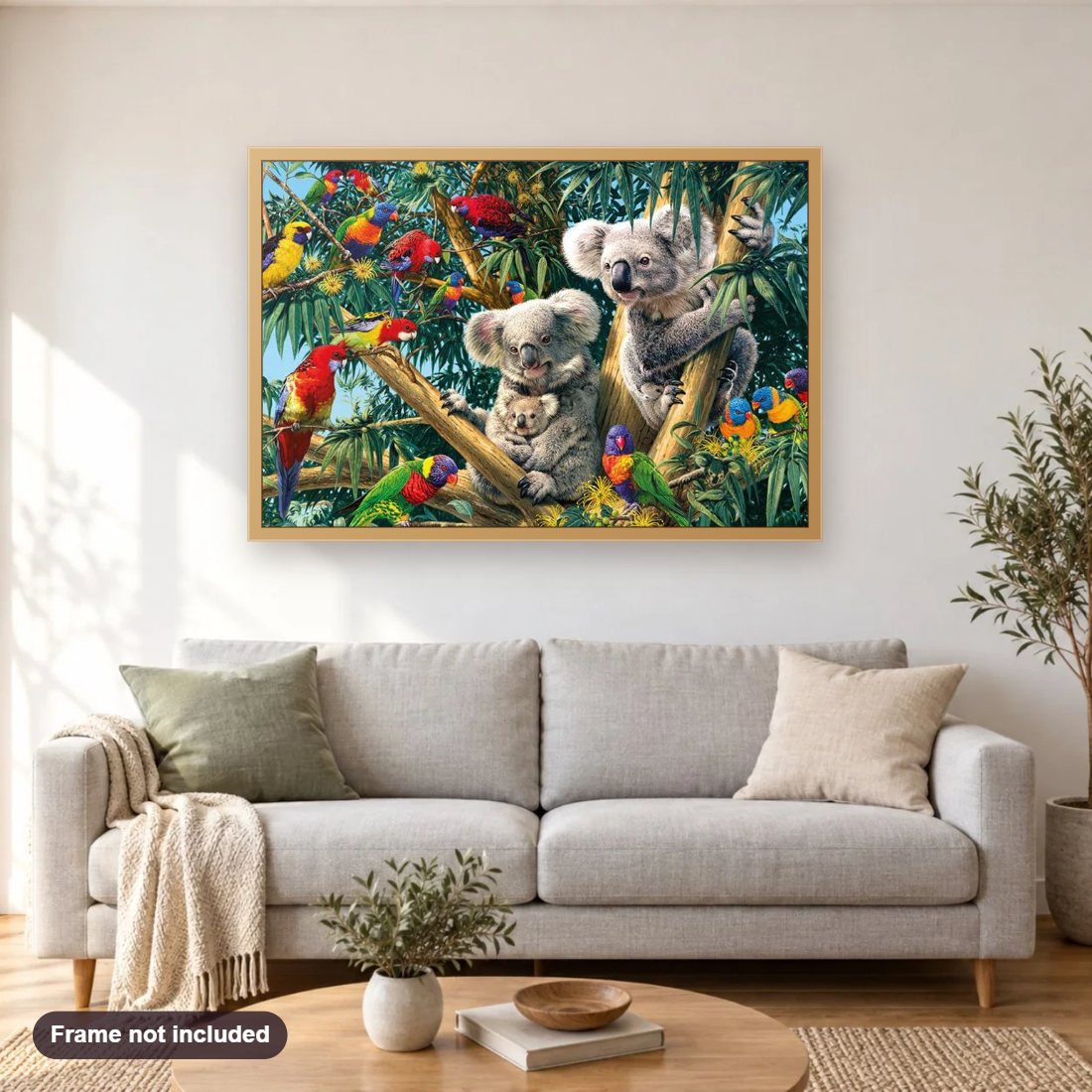 Birds & Koalas on Trees diamond painting shown framed on a living room wall above a sofa