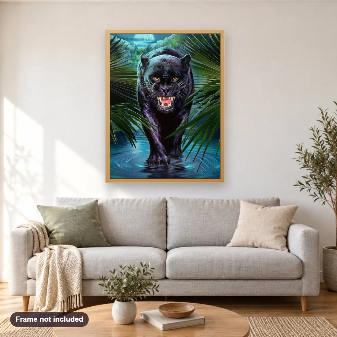 Black Panther diamond painting shown framed on a living room wall above a sofa