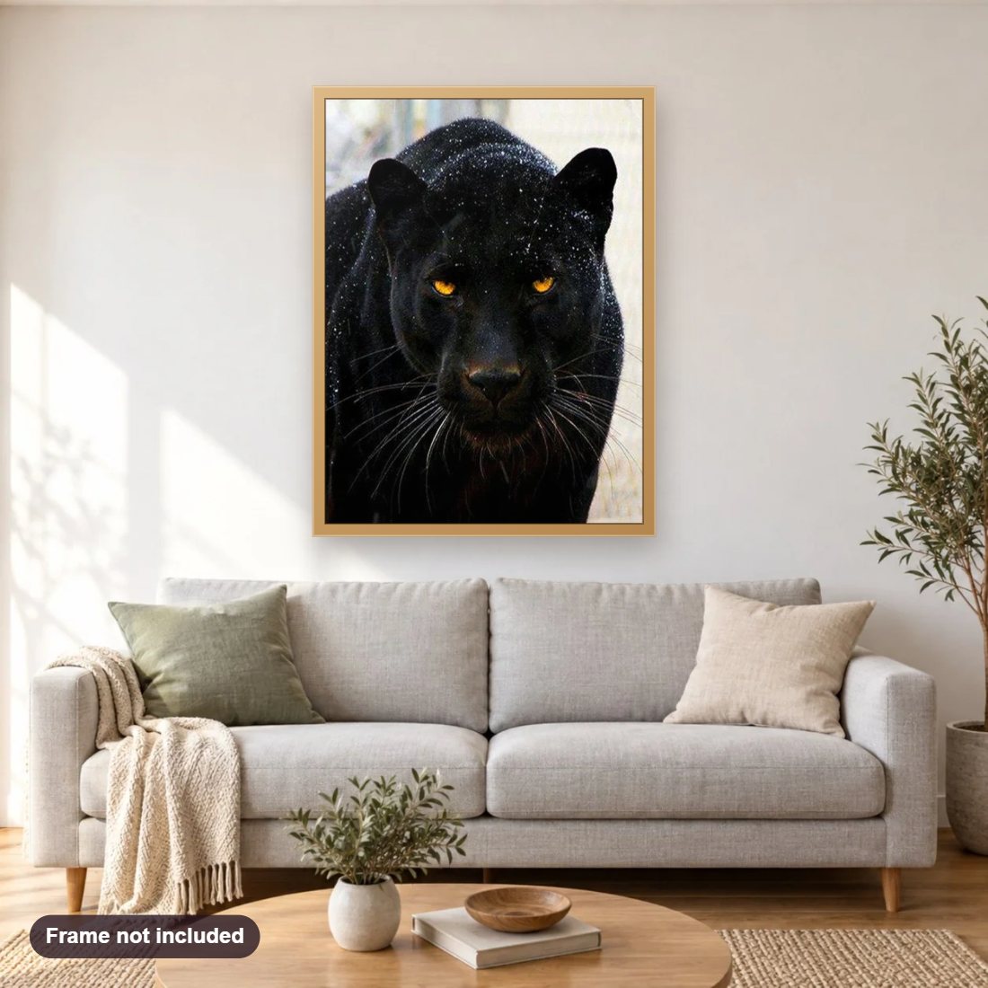 Black Panther diamond painting shown framed on a living room wall above a sofa