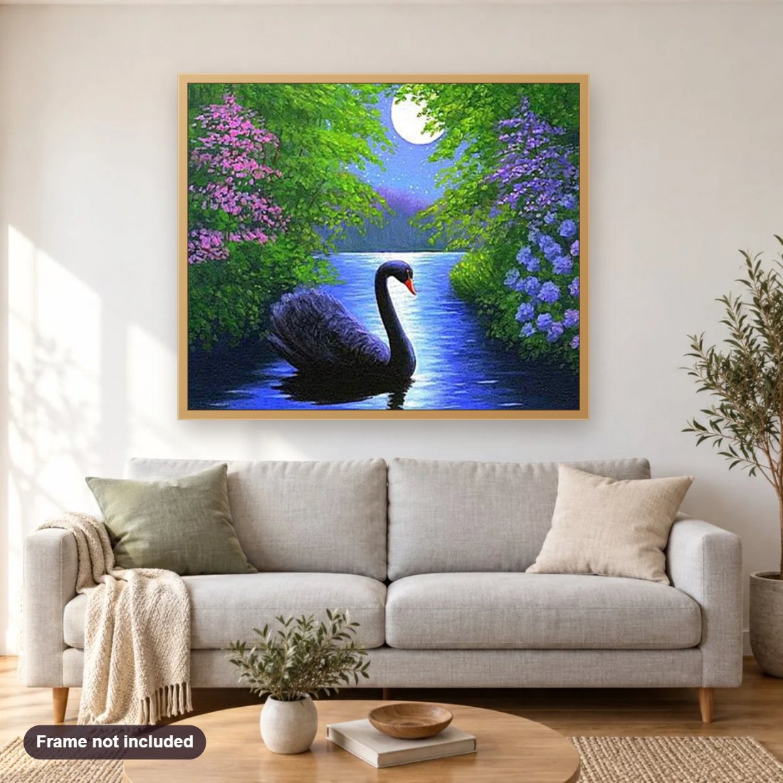 Black Swan in Water diamond painting shown framed on a living room wall above a sofa