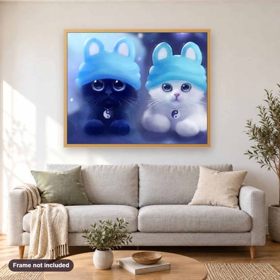 Black & White Cartoon Cats diamond painting shown framed on a living room wall above a sofa