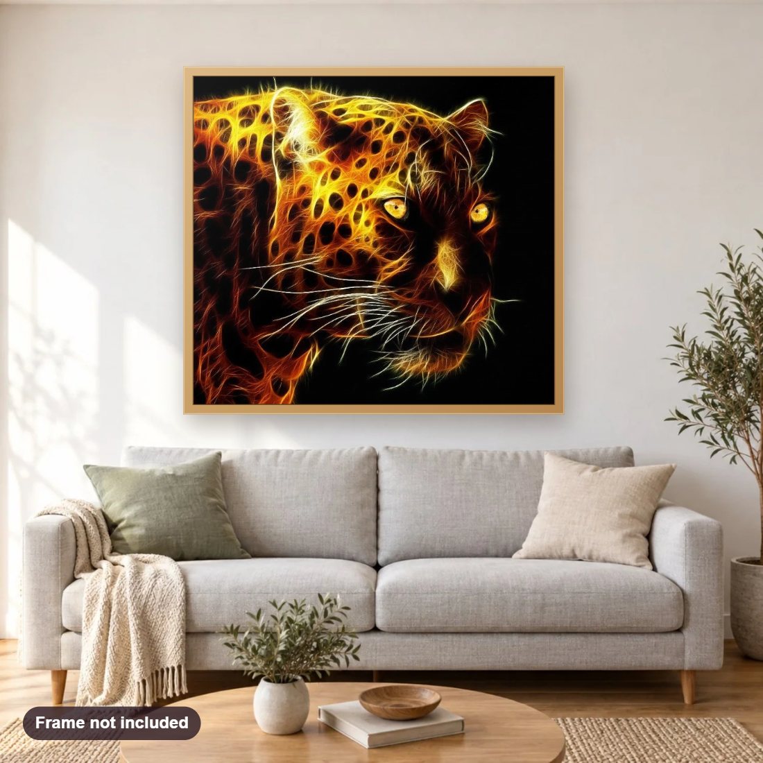 Blazing African leopard diamond painting shown framed on a living room wall above a sofa