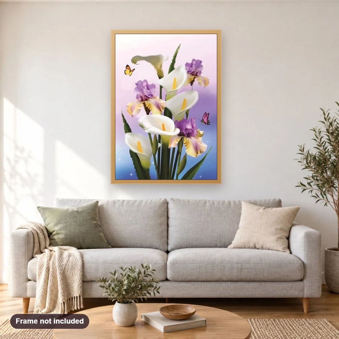Blooming Lilly Flowers & Butterflies diamond painting shown framed on a living room wall above a sofa