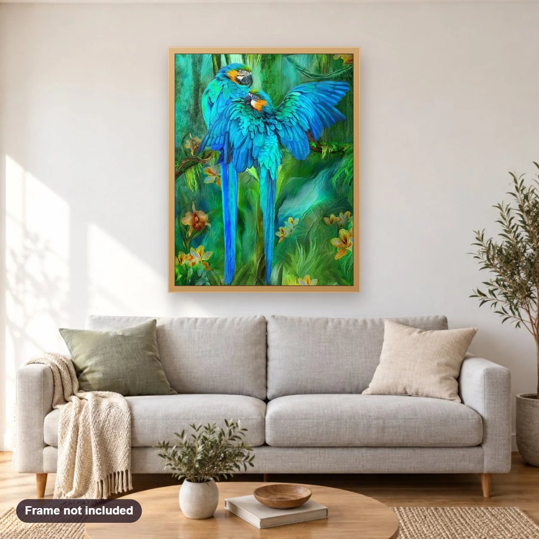 Blue African Parrots Pair diamond painting shown framed on a living room wall above a sofa