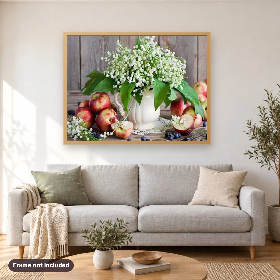 Blue Berries, Apples & Flower Vase diamond painting shown framed on a living room wall above a sofa