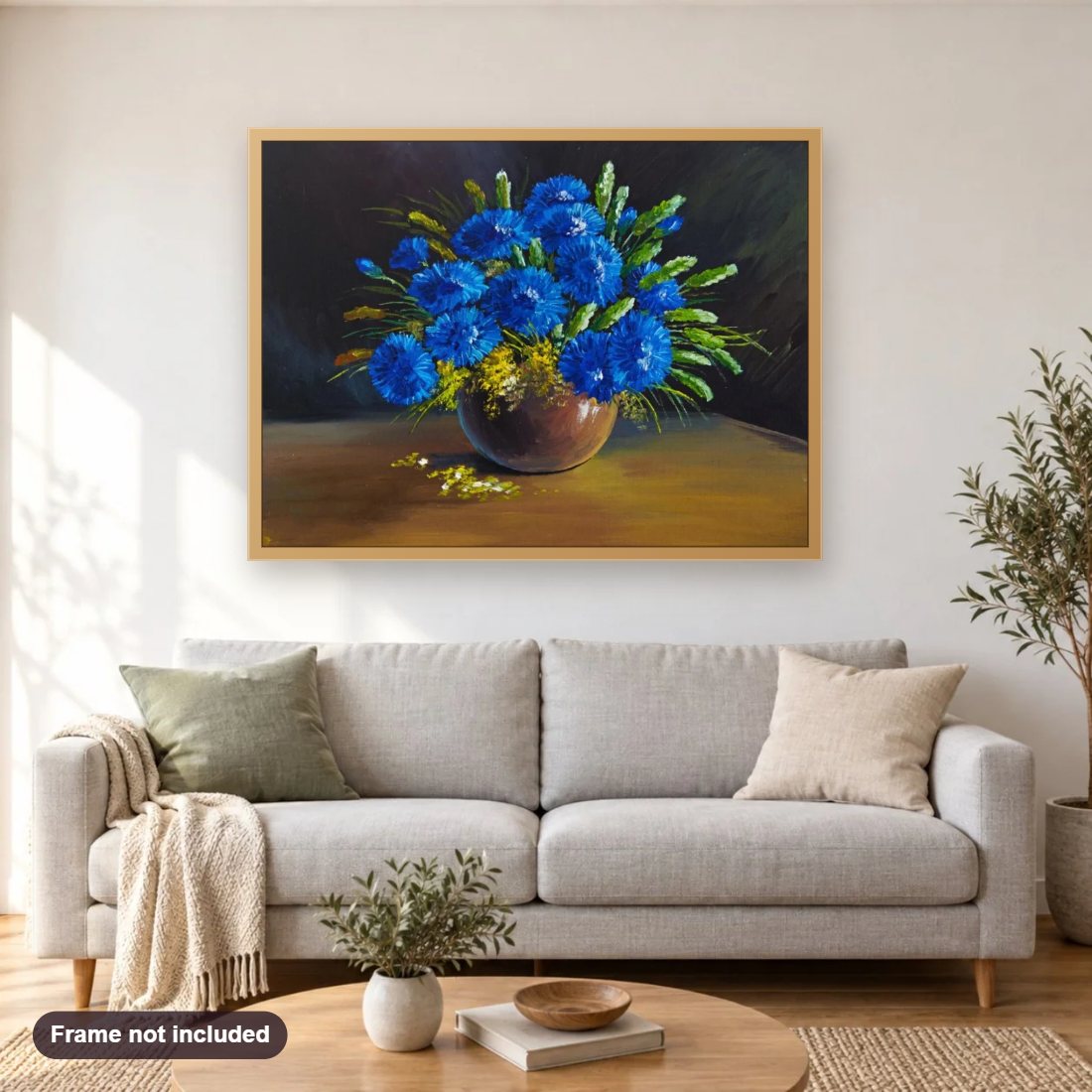 Blue Flowers Vase Still Life diamond painting shown framed on a living room wall above a sofa