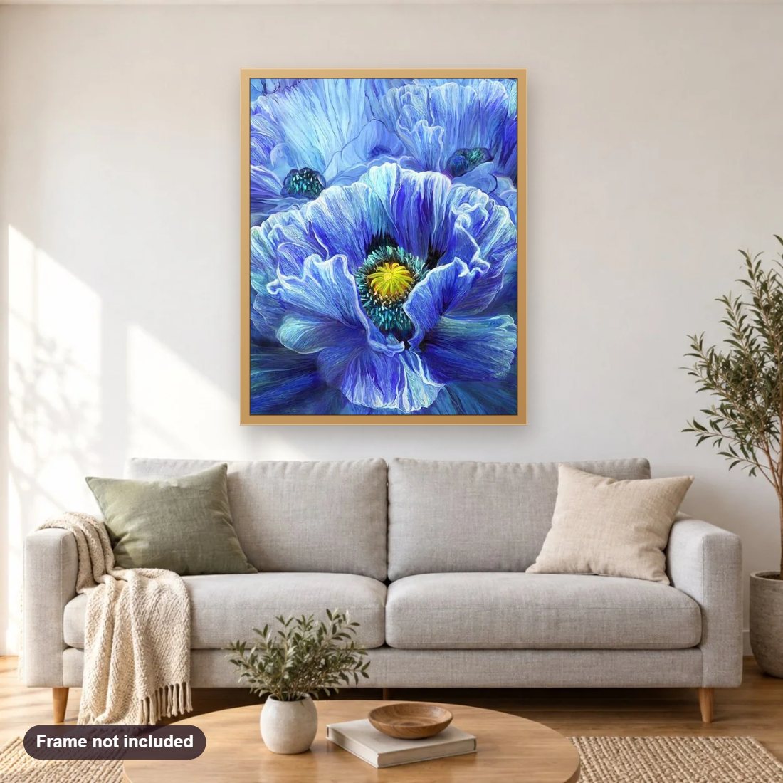 Blue Poppy by Carol Cavalaris diamond painting shown framed on a living room wall above a sofa