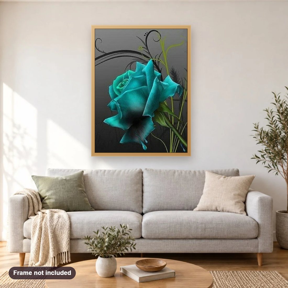 Blue Rose diamond painting shown framed on a living room wall above a sofa