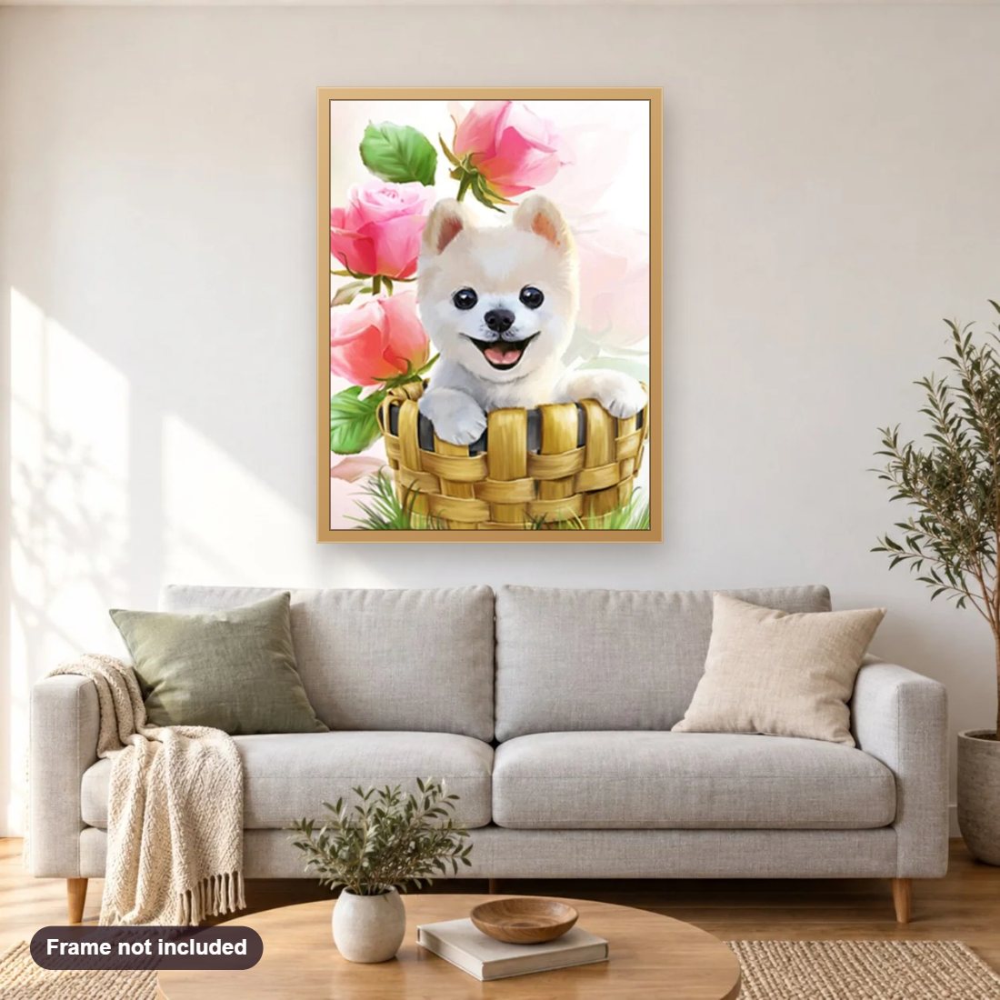 Boo in the Basket diamond painting shown framed on a living room wall above a sofa